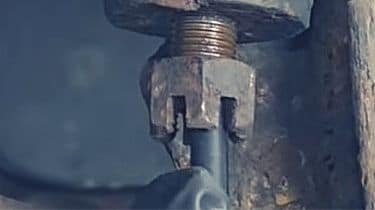 Remove The Cotter Pin and loosen the tie Nut
