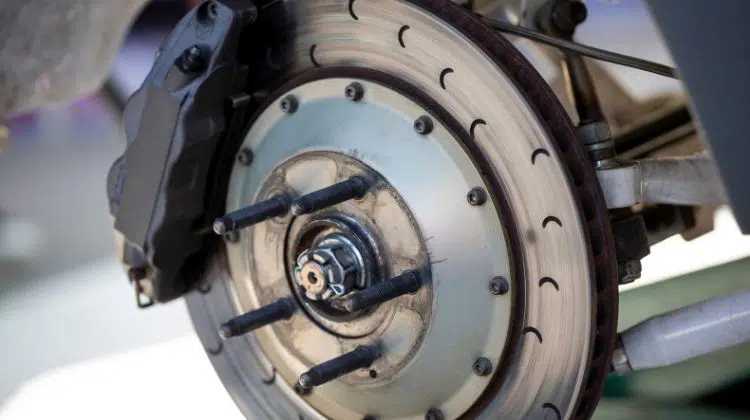 Remove the wheels, Brake Caliper, And Brake Rotors